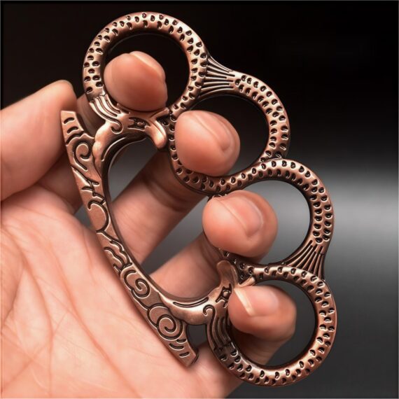 Polished brass knuckles with geometric patterns for classic self-defense